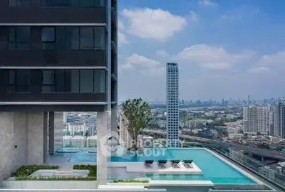 Luxurious high-rise building with stunning rooftop pool and panoramic city views.
