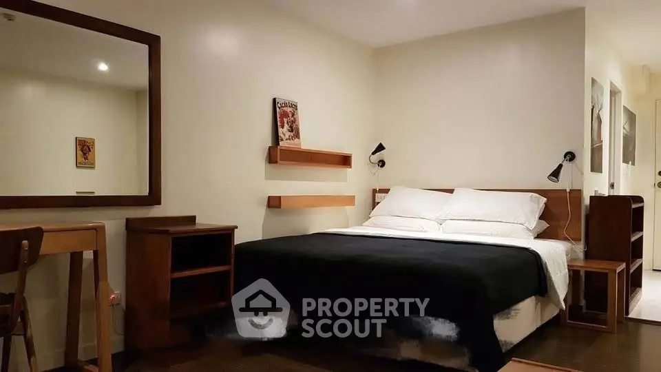 Cozy bedroom with modern wooden furniture and ambient lighting, perfect for relaxation and comfort.