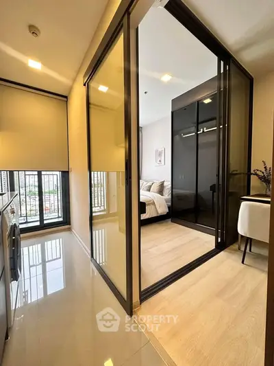 Modern apartment interior with sleek bedroom and laundry area