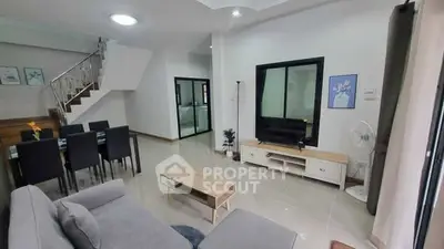 Spacious modern living room with elegant dining area and stylish decor