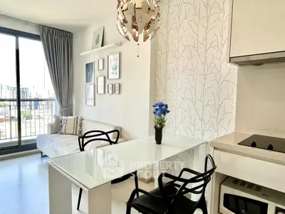 Modern living room with stylish decor and city view balcony