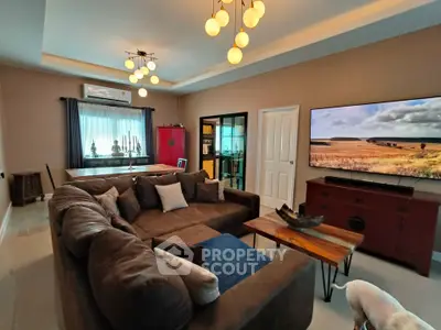 Spacious living room with modern decor and large sectional sofa