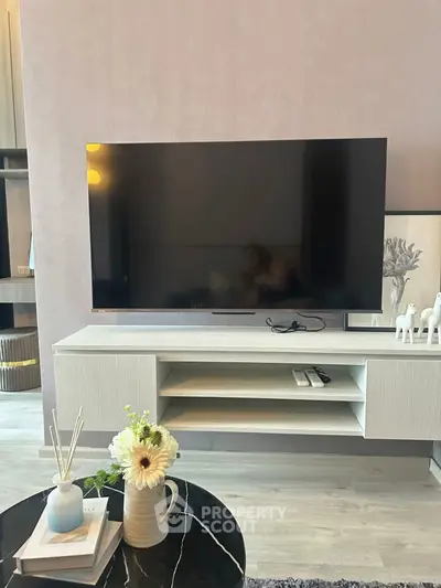 Modern living room with sleek TV setup and stylish decor