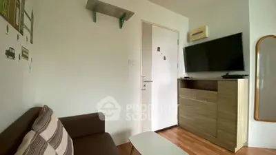 Cozy living room with modern TV setup and stylish decor