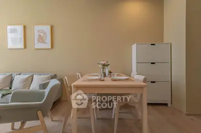 Charming living room with modern dining set and cozy seating area, perfect for stylish urban living.