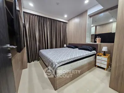 Modern bedroom with elegant decor and ample natural light