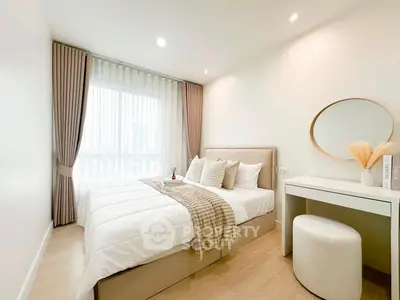 Cozy and elegant bedroom with natural light and modern decor