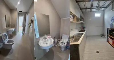 Modern bathroom and kitchen with sleek design and efficient layout in a contemporary home.