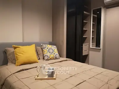 Cozy bedroom with stylish decor and modern shelving unit