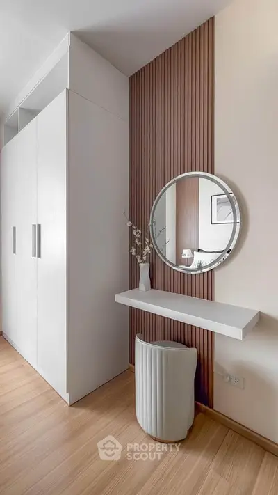 Elegant modern bedroom with stylish vanity and sleek wardrobe design