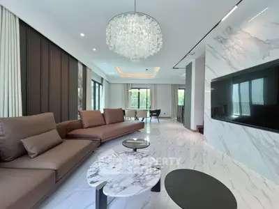 Luxurious modern living room with marble accents and elegant lighting