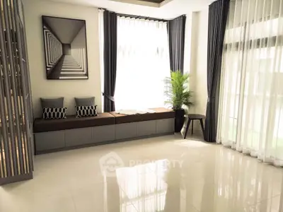 Spacious modern living room with large windows and elegant decor