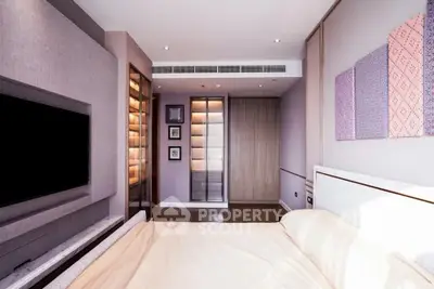 Luxurious modern bedroom with stylish decor and built-in wardrobe