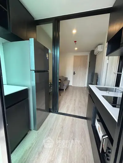 Modern apartment kitchen with sleek design and open layout