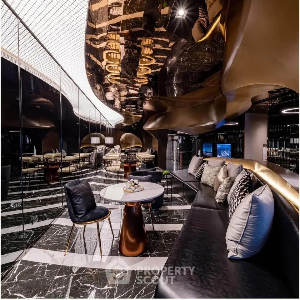 Luxurious modern lounge with elegant decor and plush seating in a high-end building.