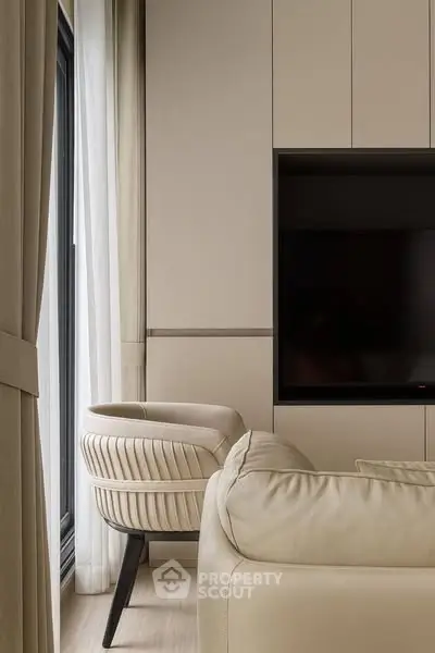 Modern living room with beige furniture and sleek design