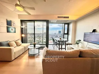 Spacious modern living room with city view and stylish decor