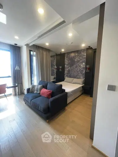 Modern studio apartment with stylish decor and natural light