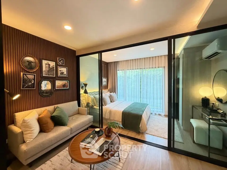 Modern living room with cozy bedroom, stylish decor, and natural light