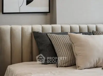 Cozy bedroom with modern decor and plush pillows