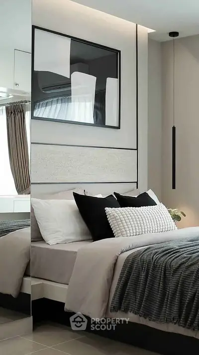 Modern bedroom with stylish decor and cozy bedding