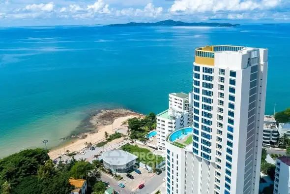 Stunning beachfront high-rise with panoramic ocean views and luxurious amenities.