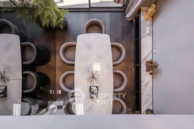 Luxurious modern dining area with elegant marble table and stylish chairs