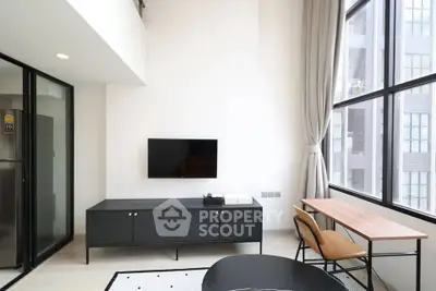 Modern living room with high ceilings and large windows in a stylish apartment