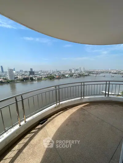 Stunning river view from a spacious balcony in a high-rise building.