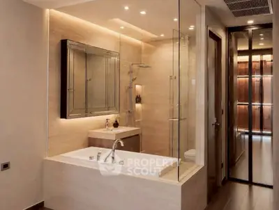Luxurious modern bathroom with glass shower and elegant lighting