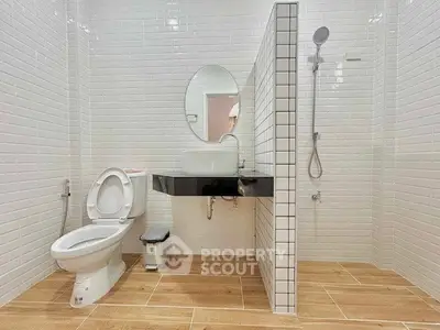 Modern bathroom with sleek fixtures and stylish tile flooring