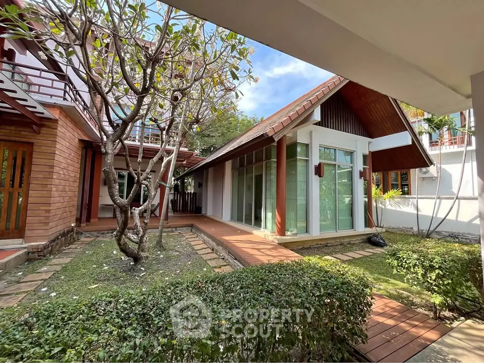 Charming modern house with lush garden and unique architectural design