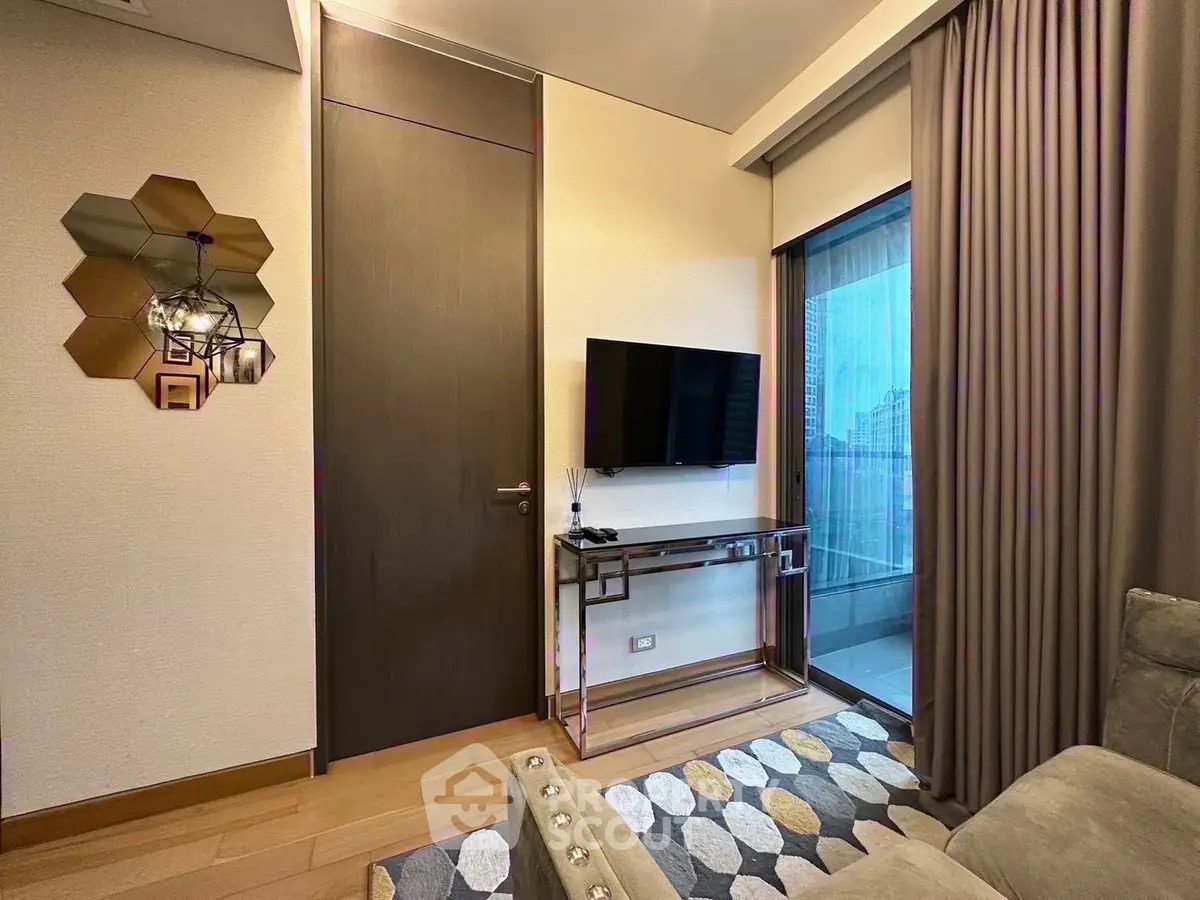 Modern living room with stylish decor and balcony view