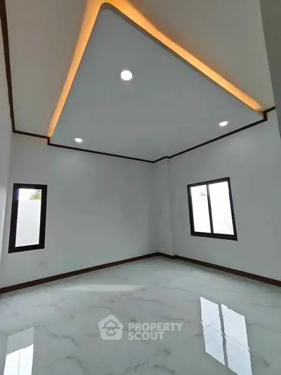 Modern minimalist room with recessed lighting and glossy marble flooring