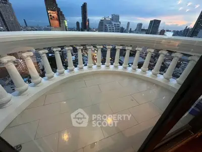 Stunning cityscape view from elegant balcony with classic balustrade, perfect for urban living.