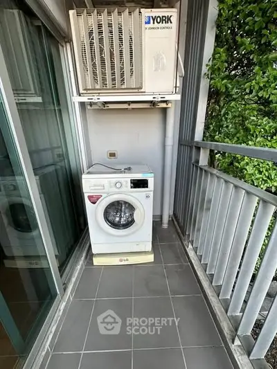 Compact balcony with washing machine and air conditioning unit