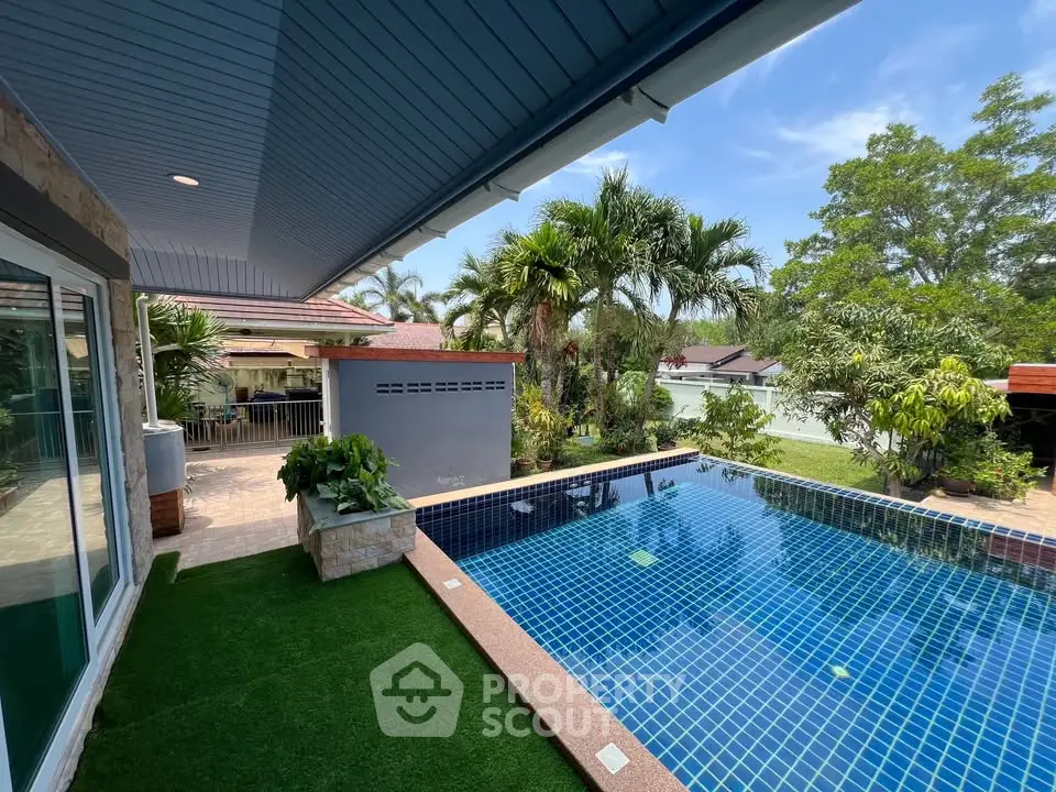 Luxurious home with private pool and lush garden, perfect for relaxation and entertaining.