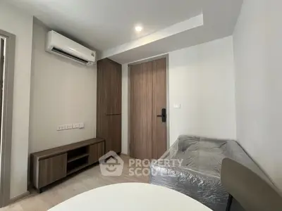 Modern living room with air conditioning and minimalist furniture