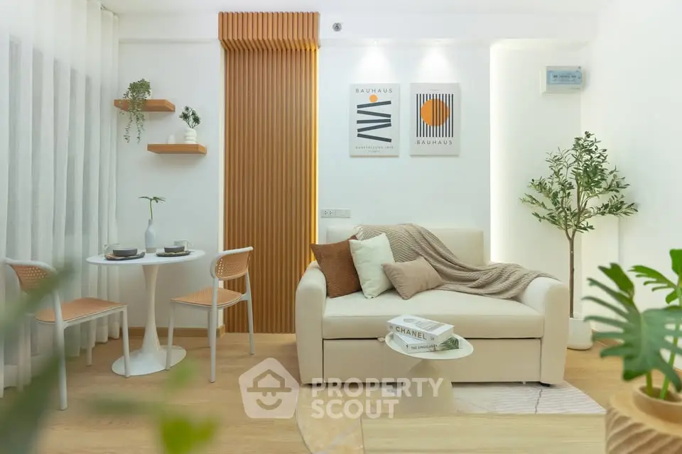 Stylish modern living room with cozy sofa and elegant decor