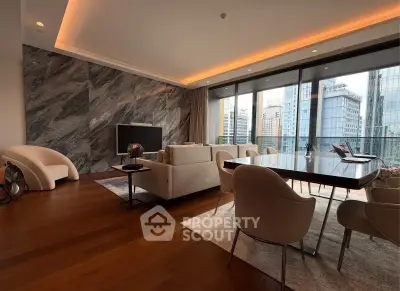 Luxurious modern living room with city view, elegant furniture, and ambient lighting.