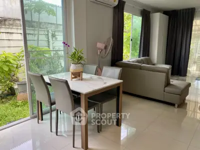 Modern living room with garden view and stylish furniture