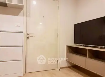 Modern living room with sleek TV stand and minimalist decor