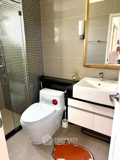 Modern bathroom with sleek fixtures and stylish tile design