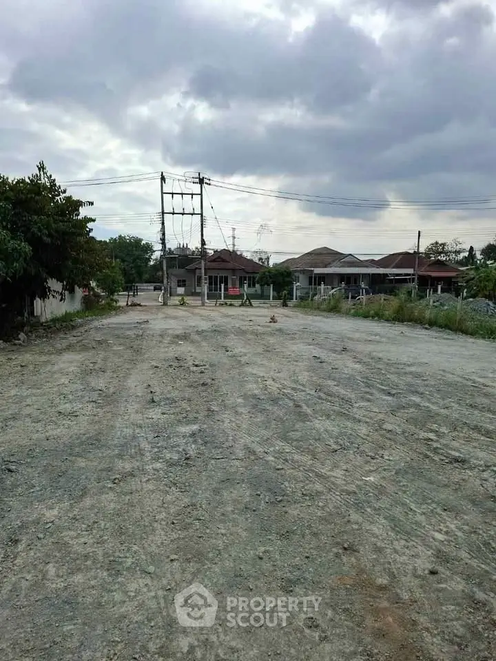 Vacant land with potential for residential development in suburban area.
