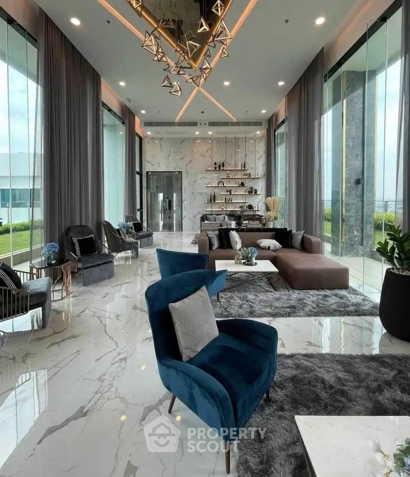 Luxurious modern living room with marble floors, plush seating, and floor-to-ceiling windows offering stunning views.