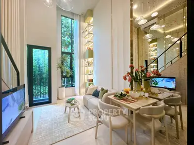 Luxurious modern living room with high ceilings, elegant decor, and abundant natural light.