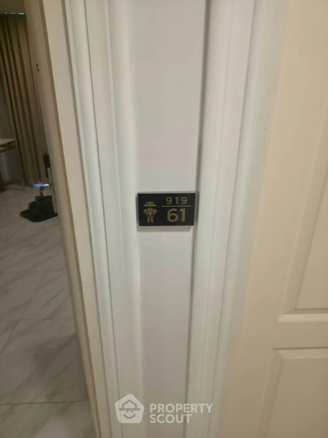 Modern elevator interior with sleek design and digital floor indicator