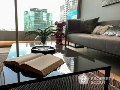 Luxurious corner unit with floor-to-ceiling windows offering an expansive city view, complemented by a plush sofa and modern glass coffee table.