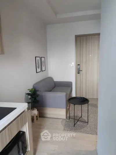 Modern compact living room with stylish decor and cozy seating area