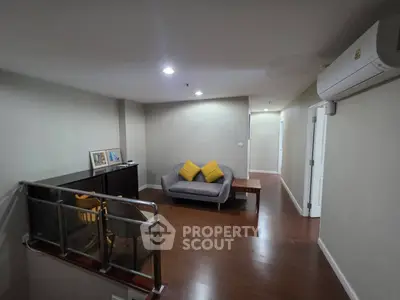 Cozy living room with modern decor and wooden flooring